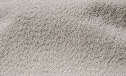 Fauteuil Myra bouclé